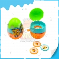 Игрушка в форме яйца с конфетами для детей 